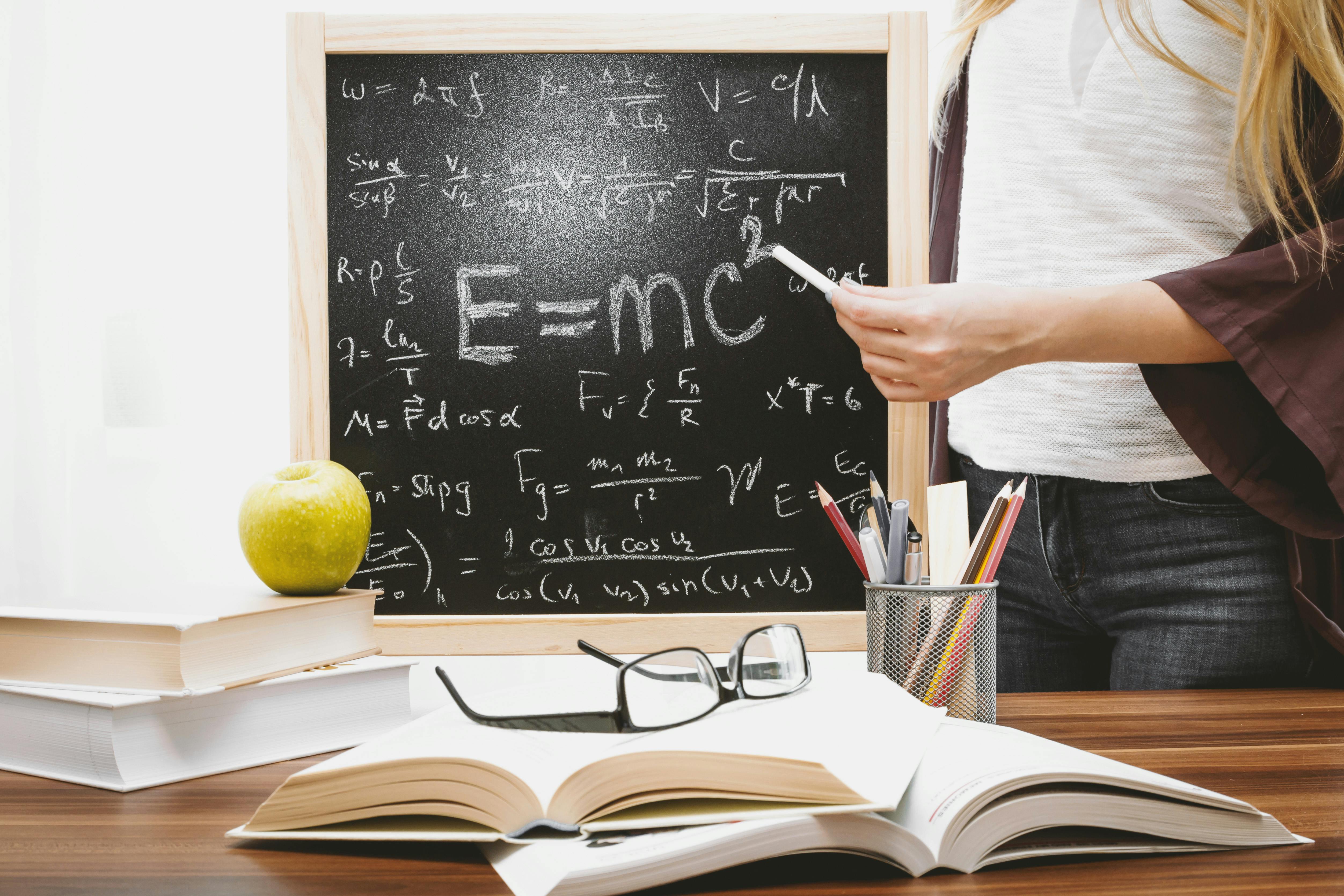 Tutor explaining physics concepts to a student